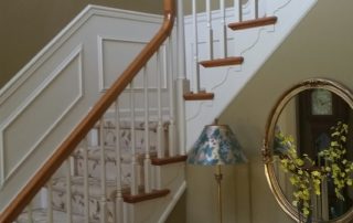 A white and brown staircase